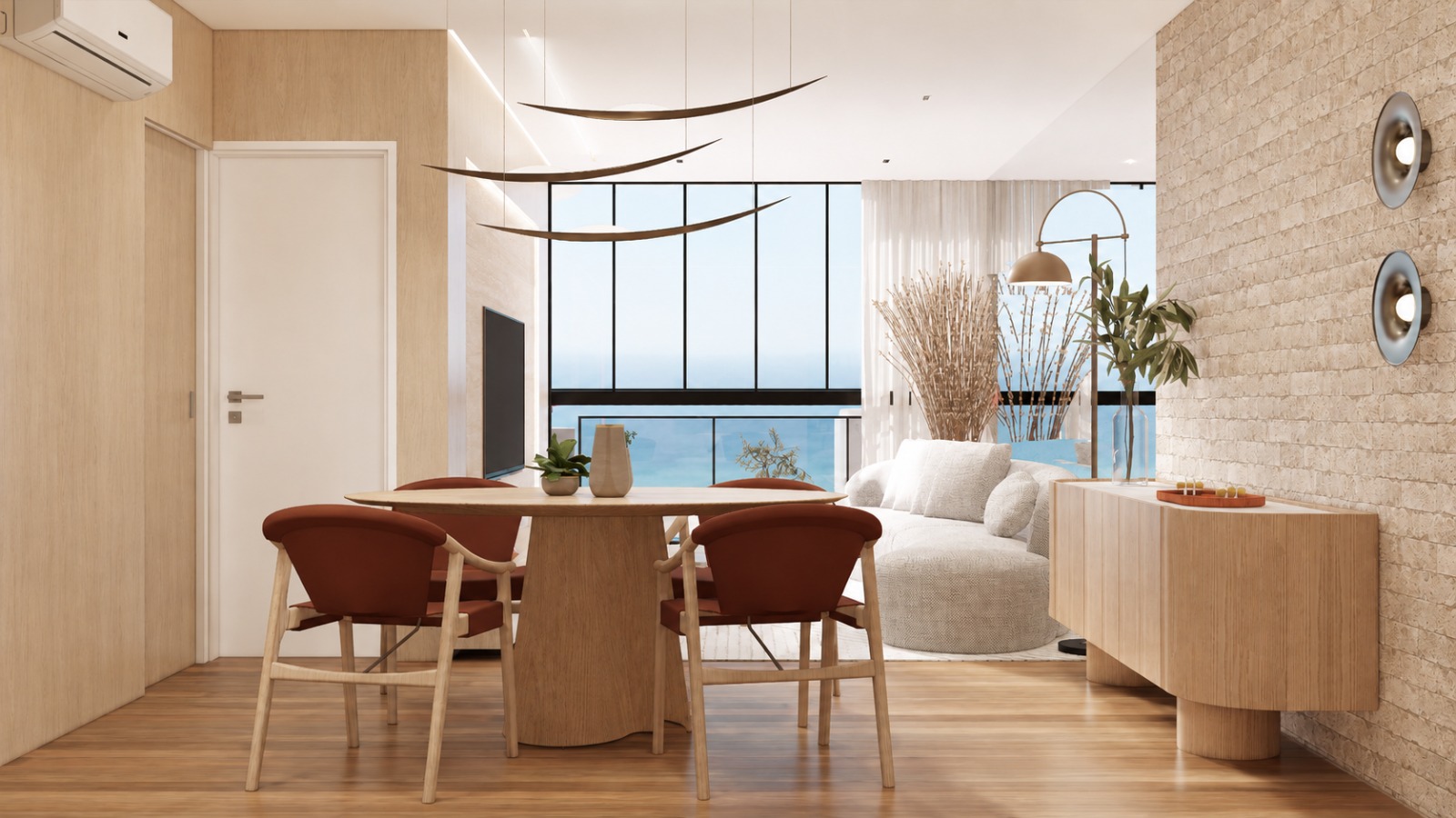 Jantar e living integrados — pendentes escultóricos em madeira e vista frontal para o mar