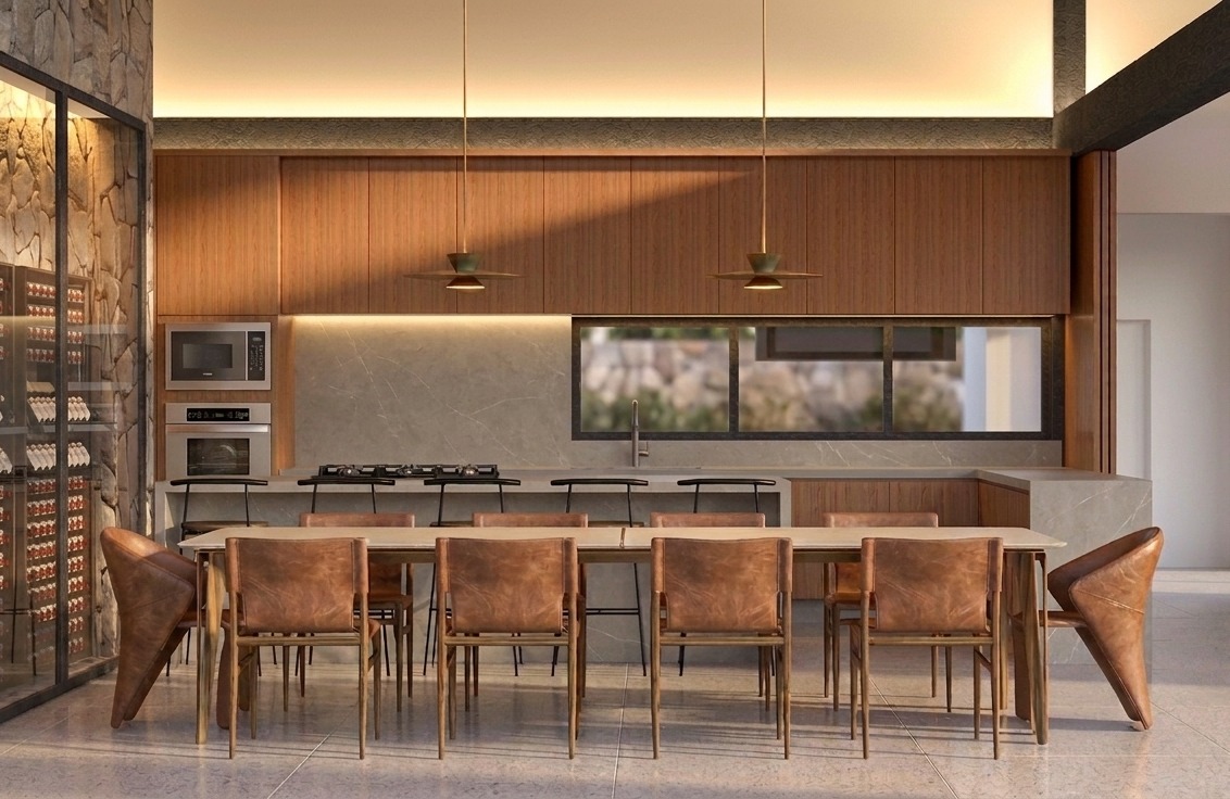 Cozinha — ilha central em pedra, marcenaria neutra e iluminação natural abundante